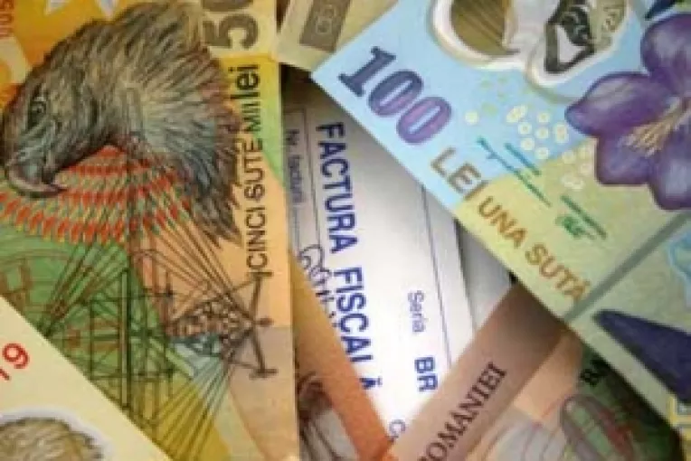 Deprecierea leului, determinata de retragerea investitorilor straini  din Romania